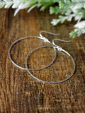 large-circle-silver-hoop-dangly-earrings