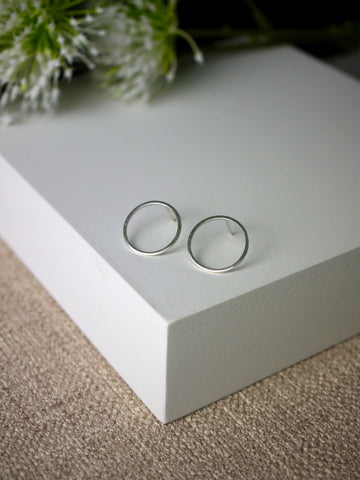 large silver geometric circle statement stud earrings
