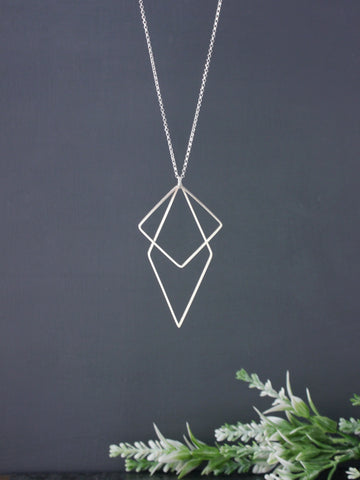 long-statement-geometric-square-diamond-silver-pendant
