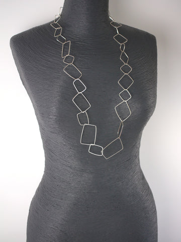 large-geometric-statement-silver-necklace-earrings-set