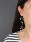 three-rectangular-linked-dangly-log-statement-silver-earrings